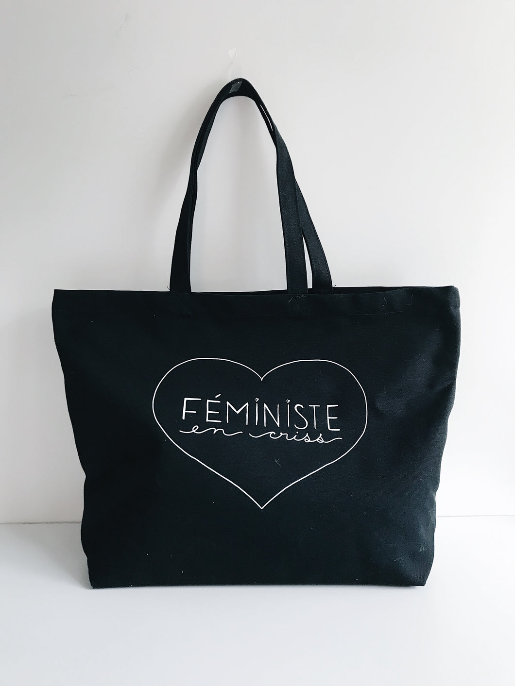 Féministe en criss - Grand sac noir sérigraphié en coton bio